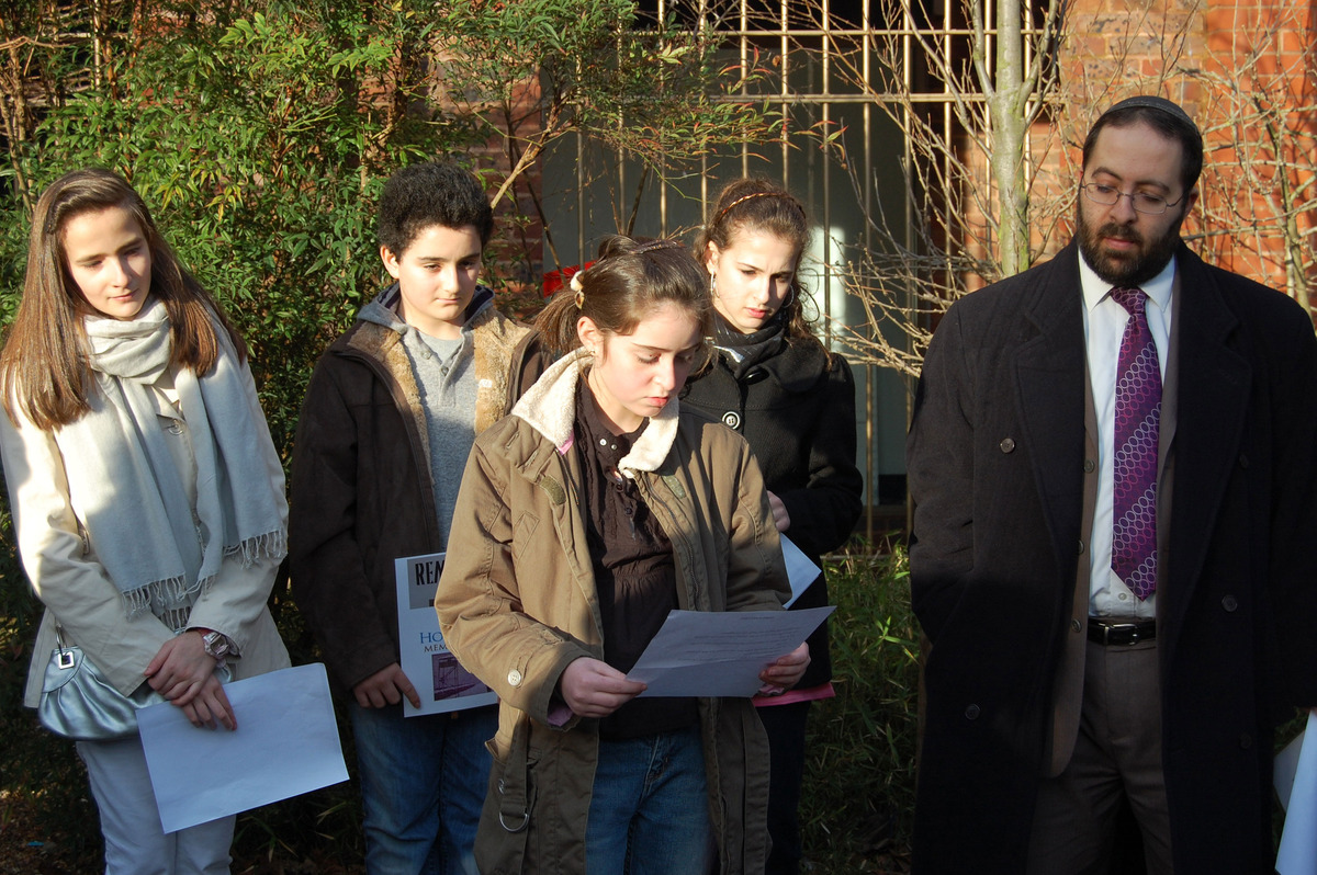 In Kingston Memorial Gardens children from the Orthodox Synagogue read poems